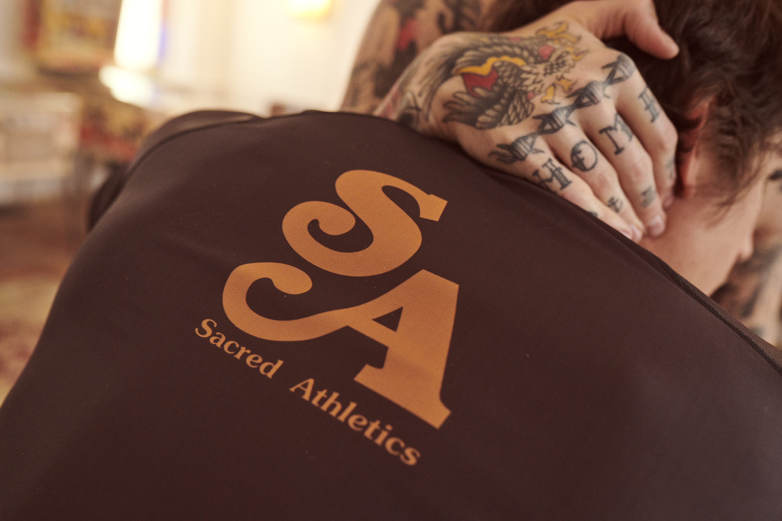 sacred athletics rash guard